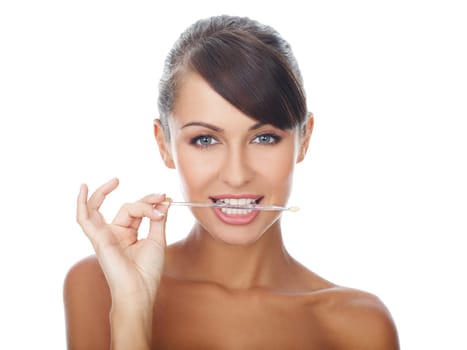 Beautiful and sexy woman doing bites brush