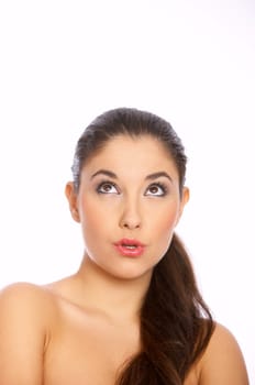 Young beautiful woman looking up, she isolated white