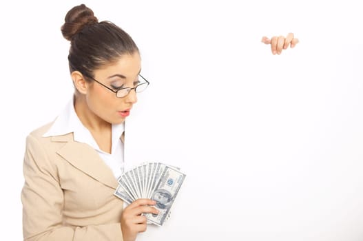 Business woman holding a bunch of money and board