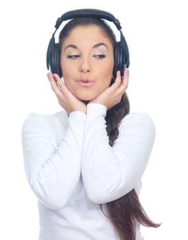 Beautiful young lady is listen to the music, isolated
