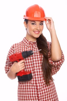 Smiling female worker with drill in her hand, isolated