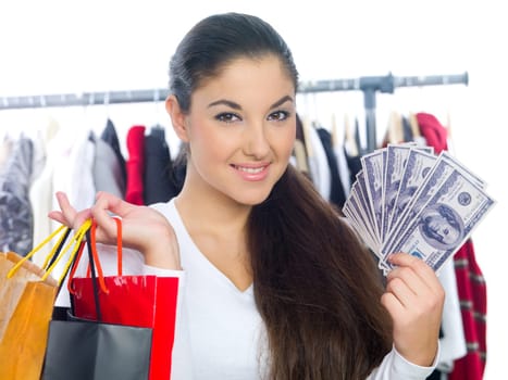 Portrait of a young lady with bags and bunch of money