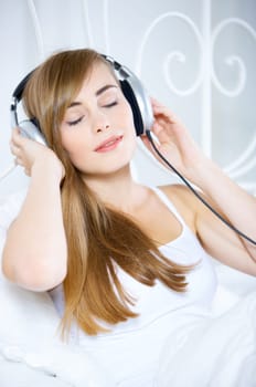 Portrait of cute teenage girl is listening music