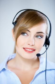 Portrait of beautiful business woman with headset
