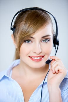 Portrait of beautiful business woman with headset