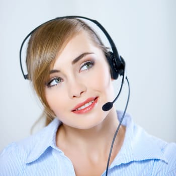Portrait of beautiful business woman with headset