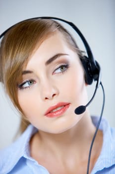 Portrait of beautiful business woman with headset
