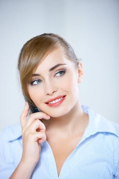 Portrait of beautiful business woman using mobile phone
