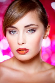 Portrait of beautiful young sexy woman on red background