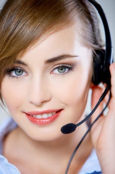 Portrait of beautiful business woman with headset