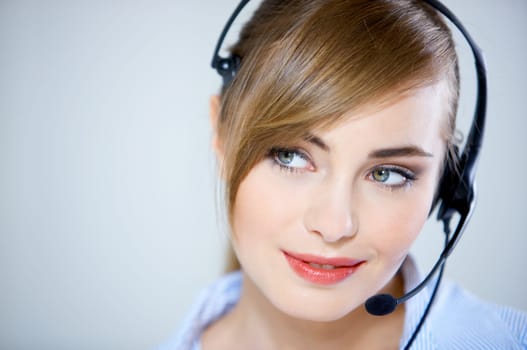 Portrait of beautiful business woman with headset