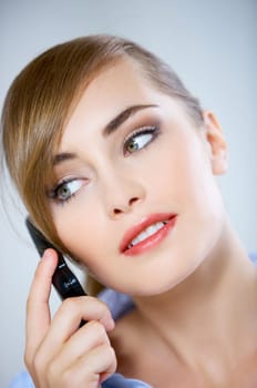 Portrait of beautiful business woman using mobile phone