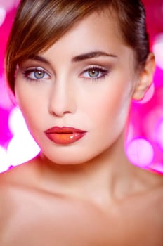 Portrait of beautiful young sexy woman on red background