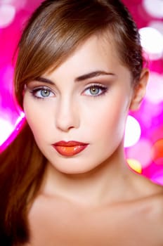 Portrait of beautiful young sexy woman on red background
