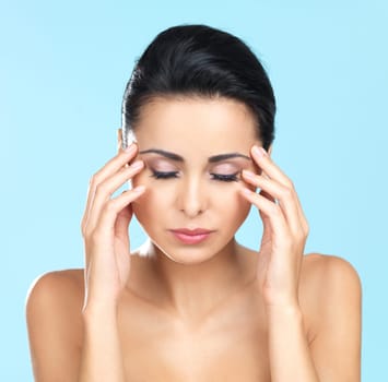 Portrait of beautiful woman, she has migraine