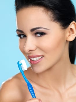 Portrait of beautiful woman with toothbrush