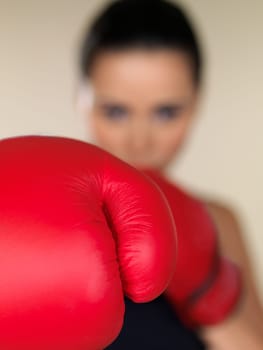 Young beautiful woman during fitness and boxing
