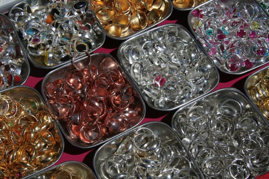 Display of ornamental metal rings in a  stall