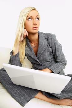 Portrait of a businesswoman when working on laptop computer