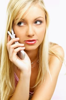 Young business woman talking by phone