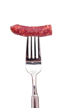 White Isolated Whipstick Sausage on a Fork