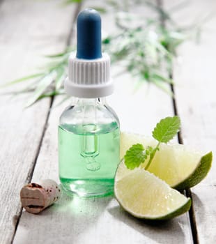 Mint essential oil with lemon for use in an aromatherapy treatment for relaxation and rejuvenation