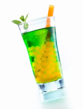 Mango Boba tea with mint bubbles and woodruff syrup isolated on white background
