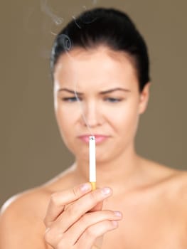 Portrait of beautiful woman, she smoking cigarette