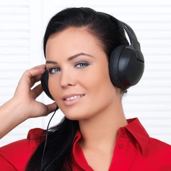 Portrait of beautiful woman, she is listen to the music