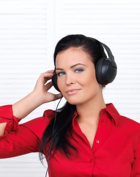 Portrait of beautiful woman, she is listen to the music