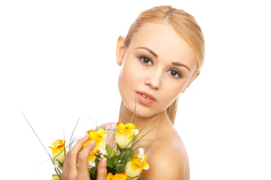 Portrait of cute blond woman, holding bunch of roses