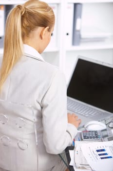 Young Beautiful business woman working in office