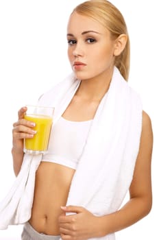 Portfait of Sporty beautiful girl holding glass of juice