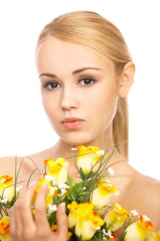 Portrait of cute blond woman, holding bunch of roses