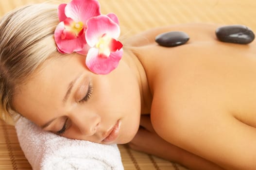 Portrait of beautiful woman during spa treatment