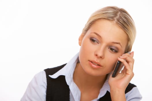 Young business woman is talking by cell phone
