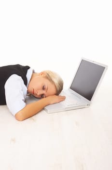 Overworked Businesswoman is sleeping on her laptop