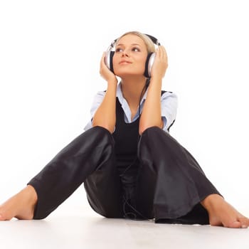Beautiful girl is listen to the music