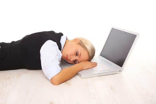 Overworked Businesswoman is sleeping on her laptop