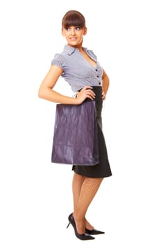 Attractive woman with paper shopping bag