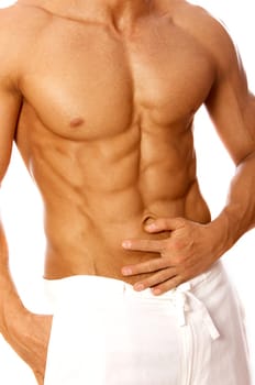 Muscular and tanned male isolated on white