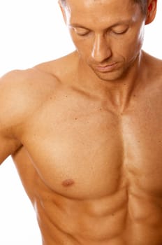 Muscular and tanned male isolated on white