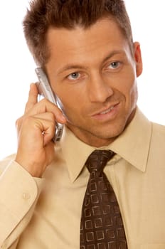 Portrait of handsome businessman is talking cell phone