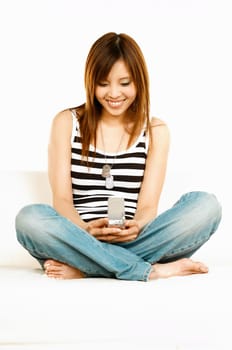Sexy asian model holding cell phone