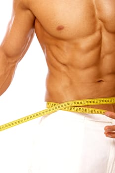 Muscular and tanned male body parts is being measured