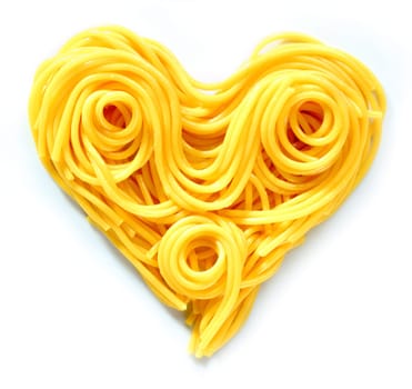 Beauty Pasta Heart. Heart-shaped arrangement of pasta, or spaghetti, isolated on white, concepetual of love and romance.