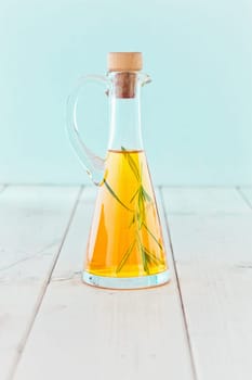 A conical bottle of cold-pressed extra-virgin olive oil for use as a salad dressing and in cooking.