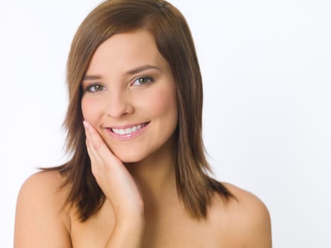 Portrait of beautiful young woman on white background