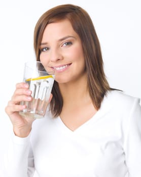 Portrait of beautiful young woman with glass of water
