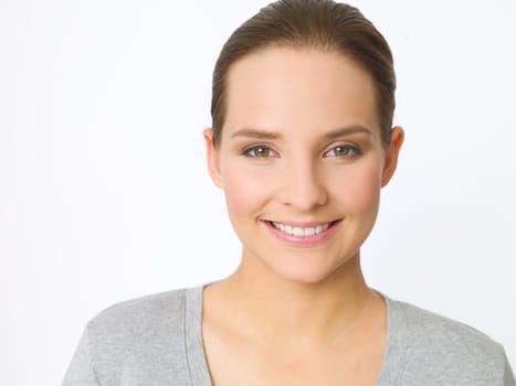 Portrait of beautiful young woman on white background